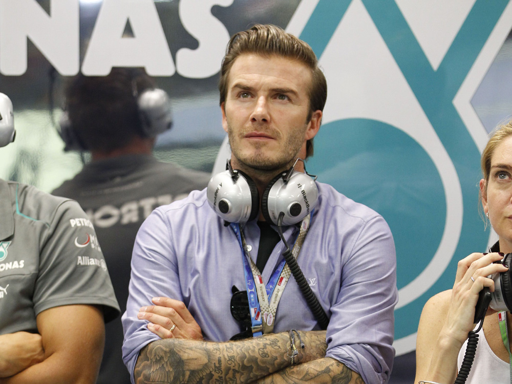 david beckham sets hearts racing as he attends singapore grand prix david beckham sets hearts racing as he attends singapore grand prix