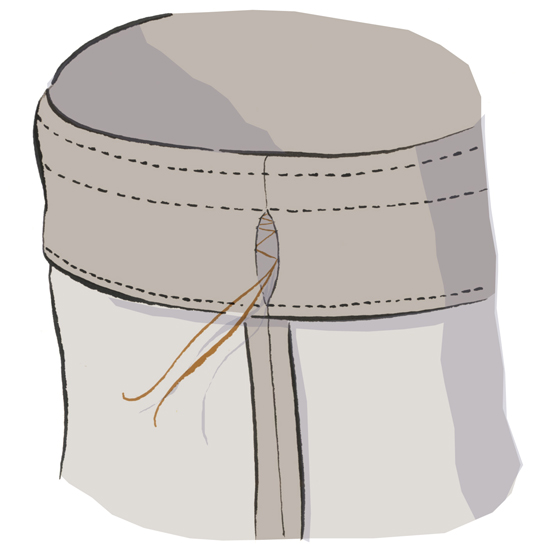 Step 6: Remove the tacking to create openings for threading the cord. \ Michael A Hill